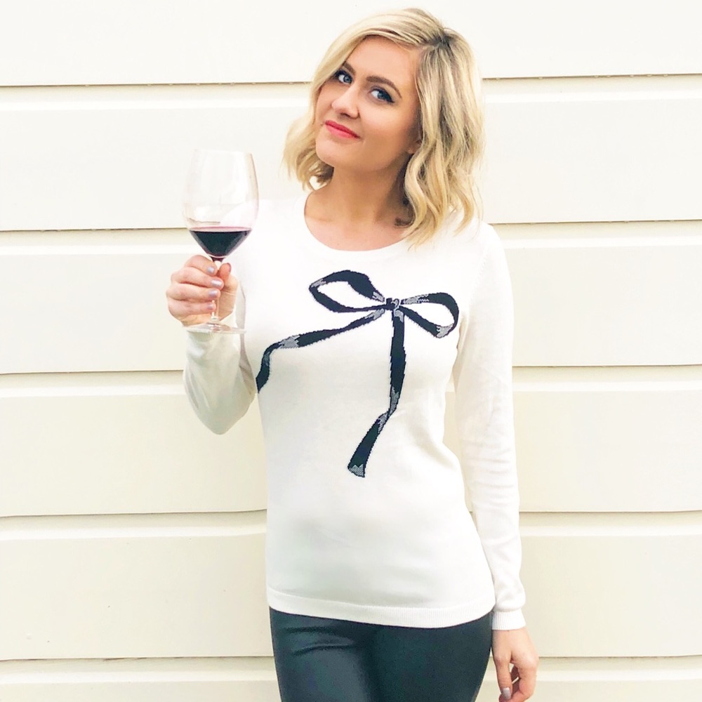 White light bow sweater